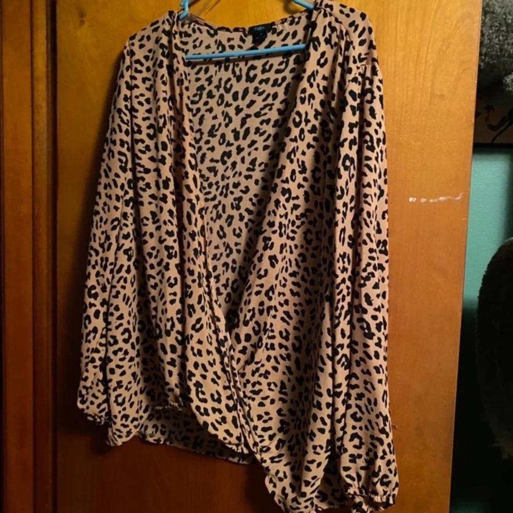 Surplice leopard top.